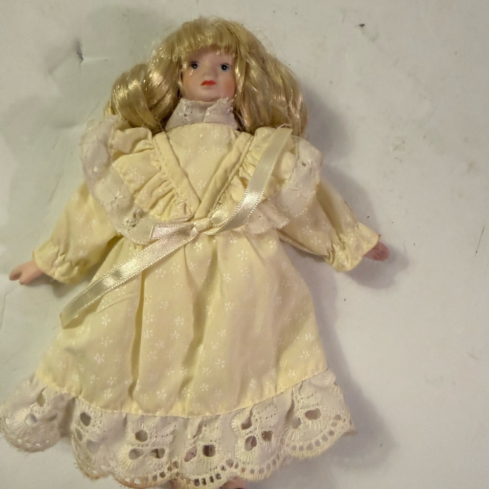 Elegant Cream porcelain Doll with Lace Dress